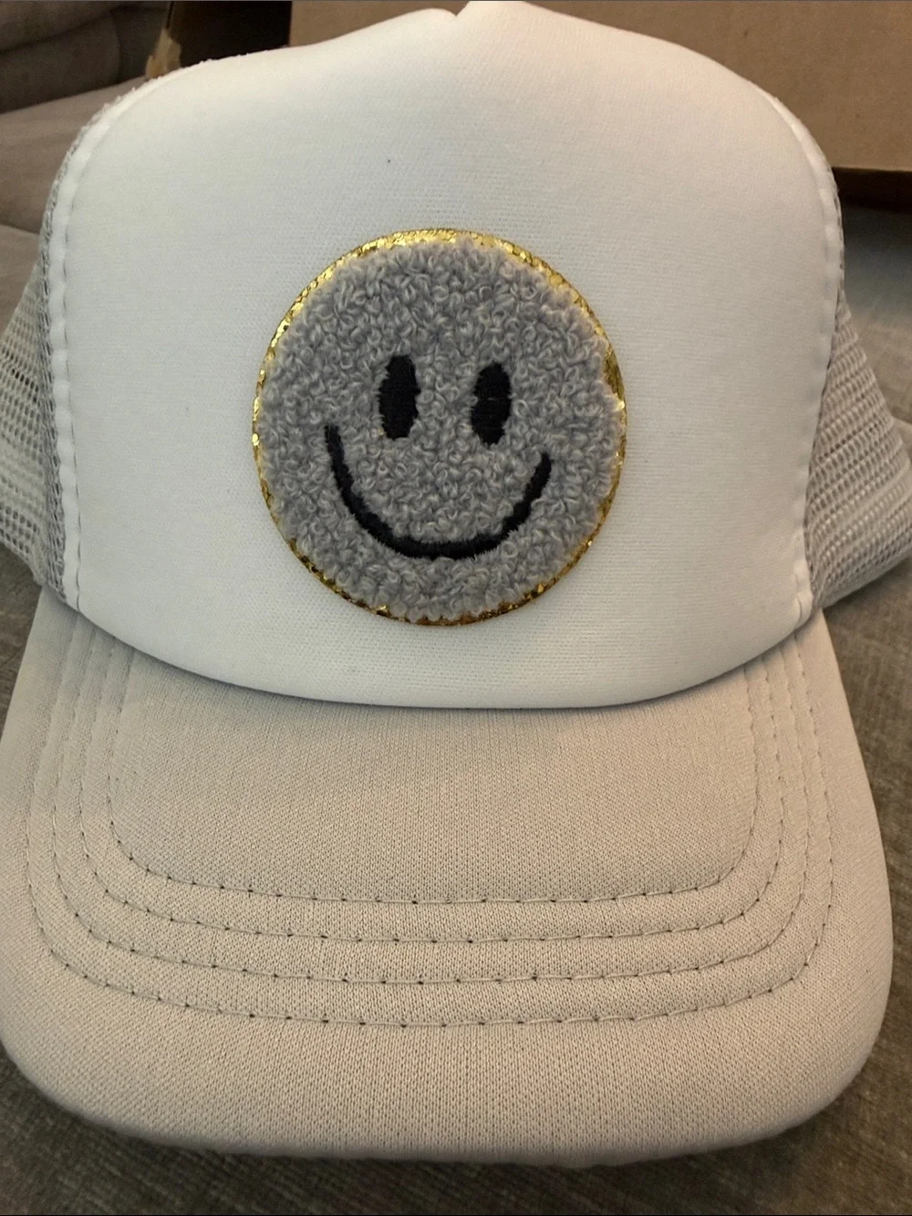 Kids White Trucker Hat with Gray Smiley Patch